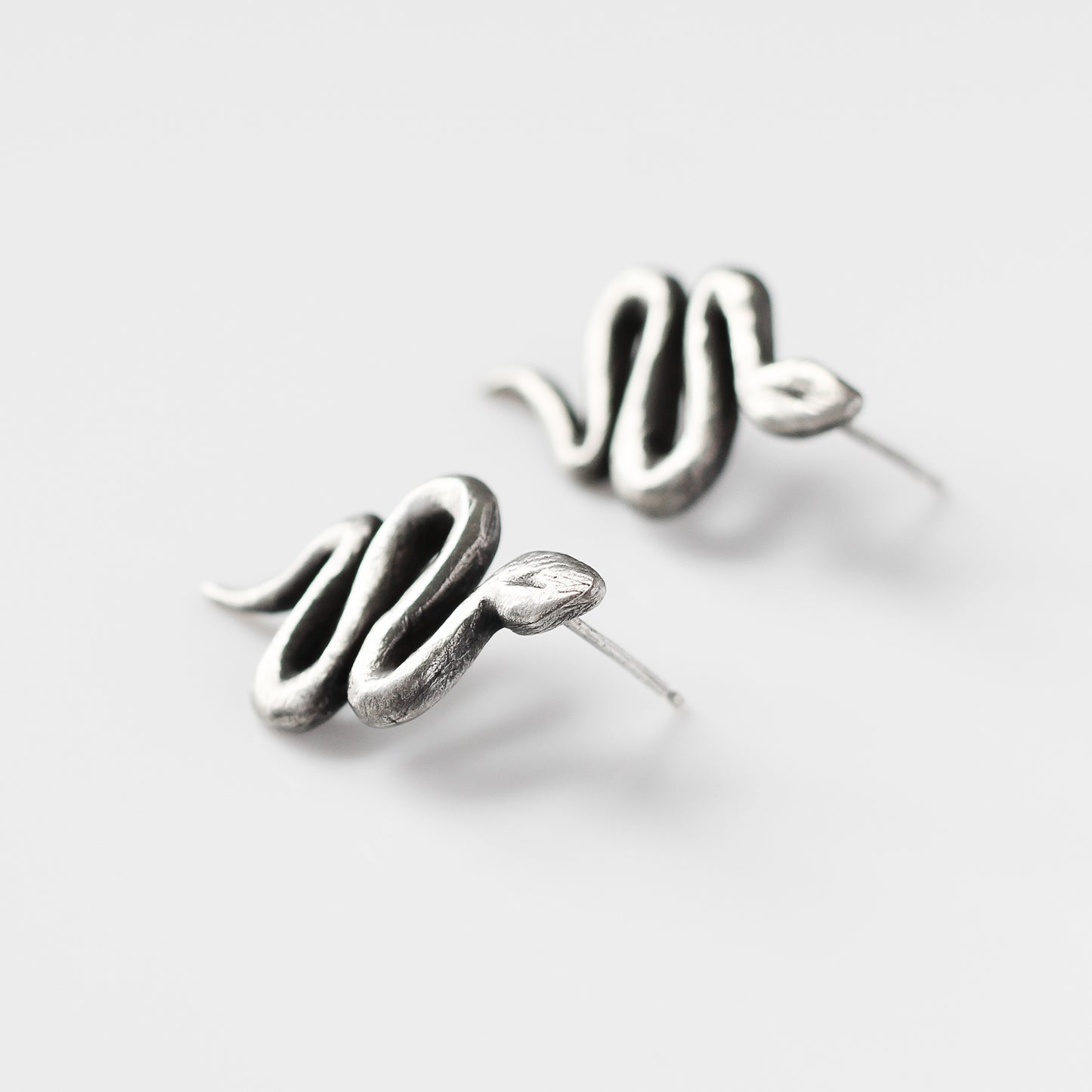 Snake Stud Earrings in Silver